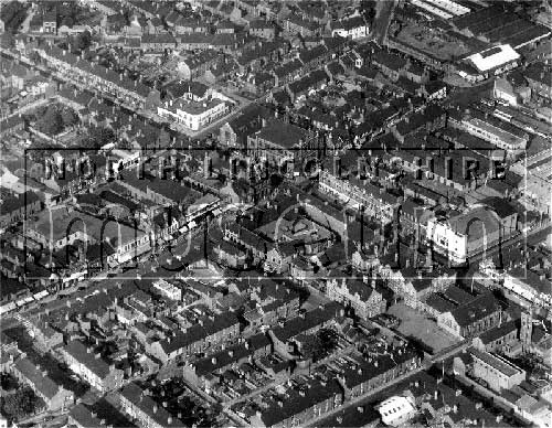 Aerial view of the High Street at the junction with Well Street and Cole Street, Scunthorpe, in 1950.	