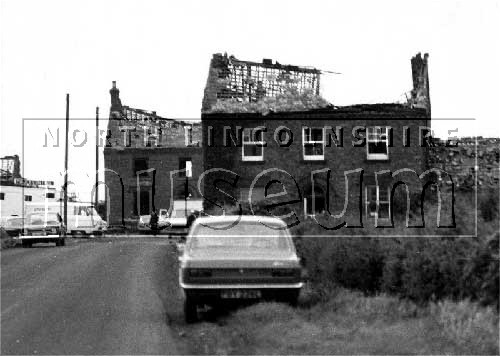 Damage to nearby housing following the explosion at Nypro Chemical Works, Flixborough, in 1974.	