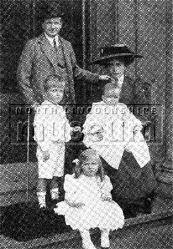 Sir Berkeley Sheffield with his wife Julia and children Robert, George and Diana in the main entrance to Normanby Hall in 1910. 	