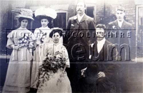 Wedding photogaph taken on 30 April 1908 in Porkess Yard, Burton-upon-Stather. 	