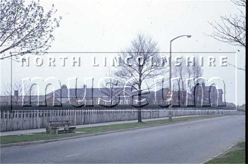 Doncaster Road, Scunthorpe, looking east, with the former Scunthorpe Grammar School on the left, c.1960's 	