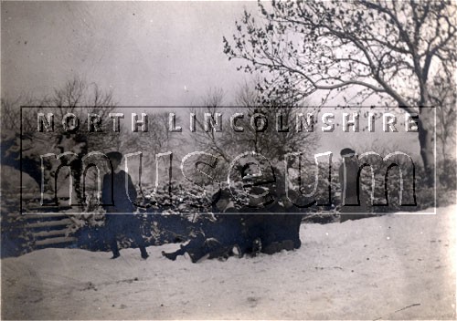 Children sledging on Ferry Road, Crosby, Scunthorpe, after snow in 1910 	
