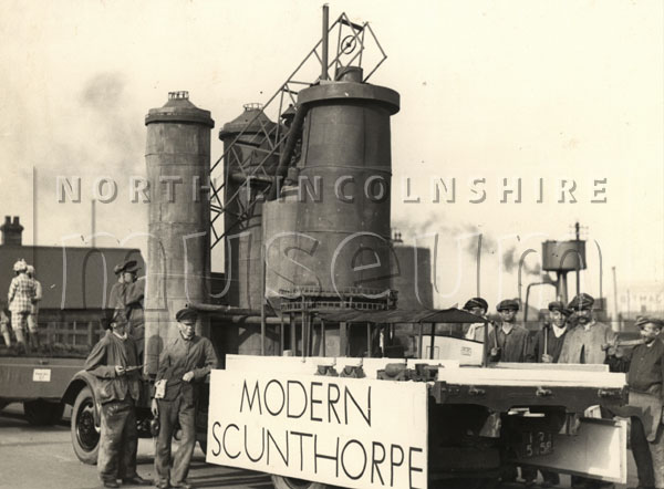 A float in the Scunthorpe Charter Day procession depicting an aspect of the town's history; 'Modern Scunthorpe', on 10 October 1936