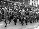 Barton-upon-Humber Home Guard parading through the Market Place during the Second World War. 	