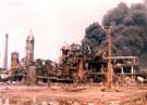 Fire still in progress at Nypro Chemical Works, soon after the explosion, Flixborough, on 6 June 1974 	