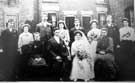 Wedding photograph taken outside Porkess Yard, Burton-upon-Stather, on 30th April 1908. 	