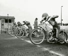 Start line and racers at the Scunthorpe Speedway track, c.1980's.