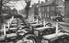 David Brown 990 tractors parked outside Belton Brothers & Drury who dealt in farm machinery in Eastoft, North Lincolnshire. 